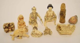 Group of resin and/or composite Japanese carvings of figures and animals