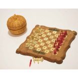 Small walnut and bone inlaid folding chessboard of scalloped square form with brass hinges and