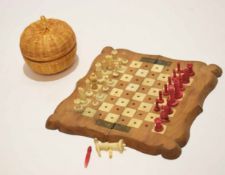 Small walnut and bone inlaid folding chessboard of scalloped square form with brass hinges and