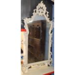 Painted framed wall mirror, carved with scrolls and foliage etc, 67cm wide x 132cm high