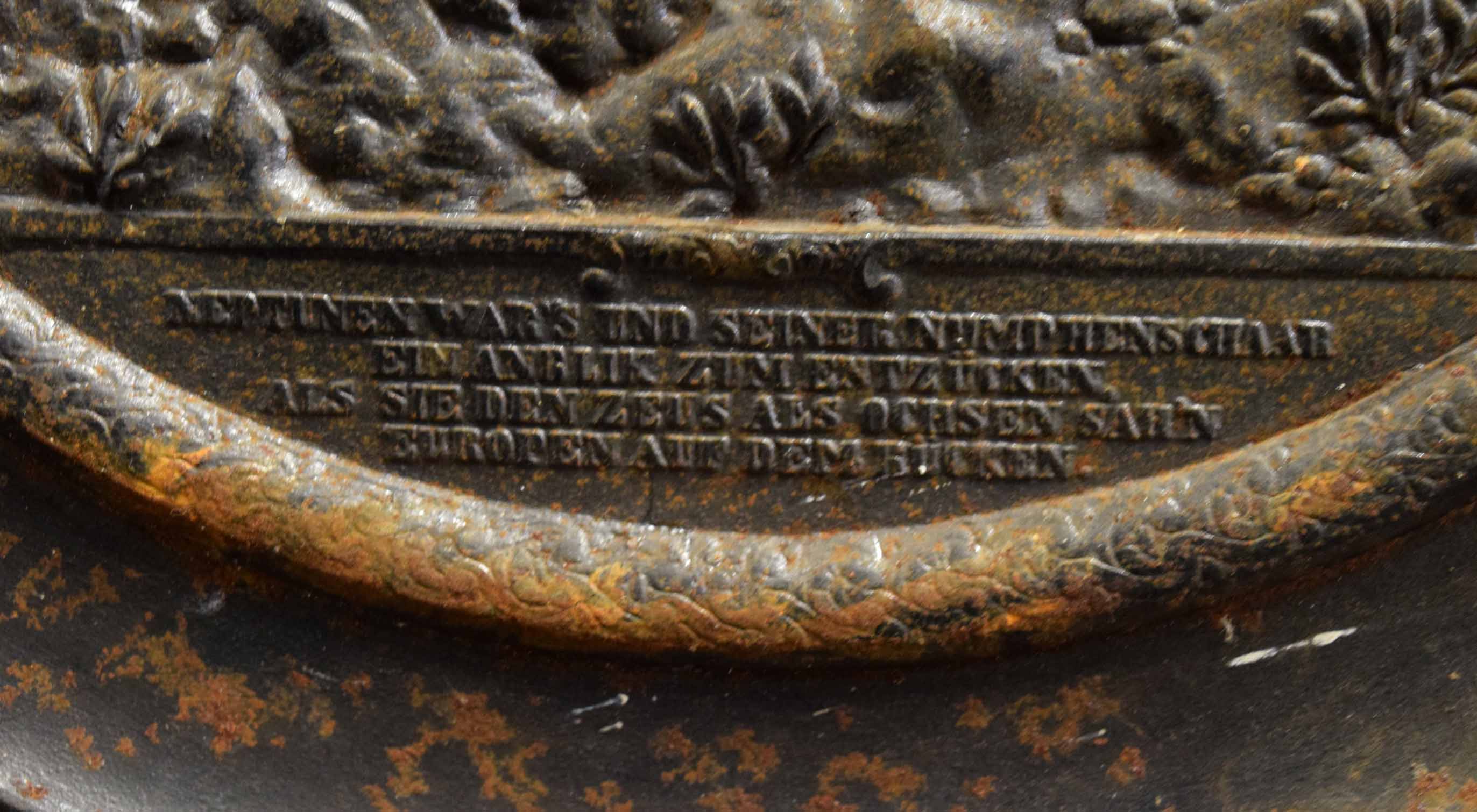 Metal plaque with a classical scene with inscription in German below within a scroll border, 43cms - Image 2 of 2