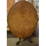 Victorian figured mahogany loo table of oval form, inlaid top, raised on quadruped base, 135cm wide