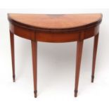 Early 19th century satinwood mahogany and rosewood cross-banded demi-lune card table lifting top