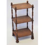 Small mahogany whatnot, the uprights with acorn finials, three shelves and raised on circular