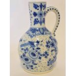 19th century pottery ewer with underglaze blue design in Delft style, 21cm high