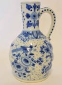 19th century pottery ewer with underglaze blue design in Delft style, 21cm high