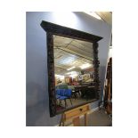 19th century Gothic oak overmantel mirror, the uprights moulded with lion mask, foliage and fruit