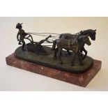 Modern patinated and cast brass model of a two-horse ploughing team on an oval naturalistic base