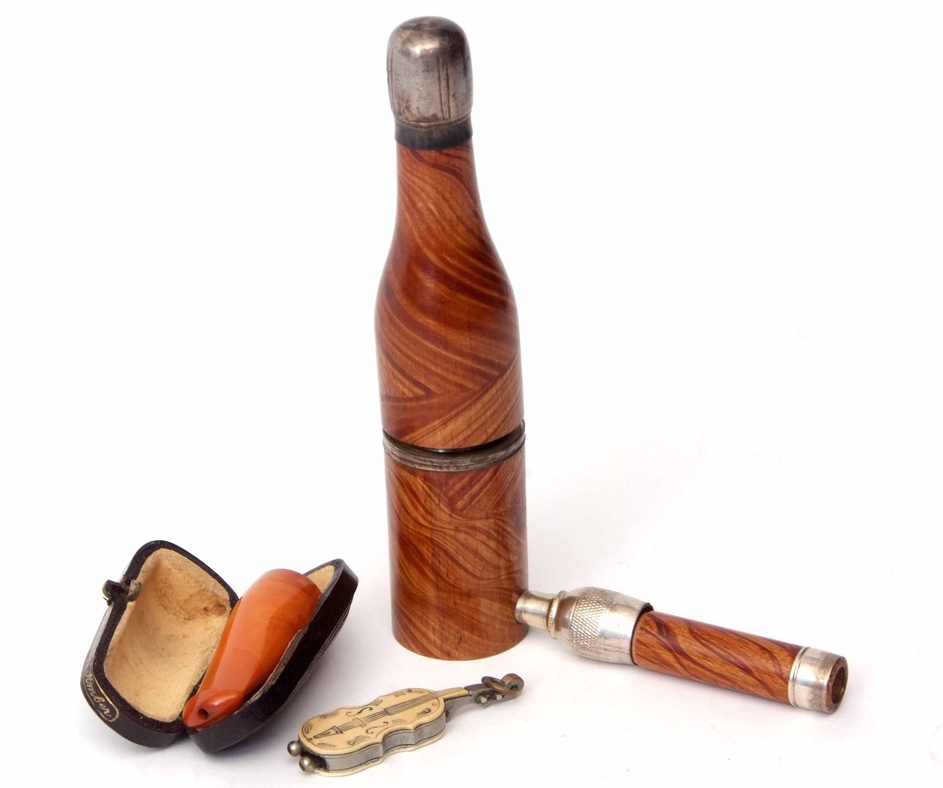 Mixed Lot: smoker's pipe modelled in the form of a champagne bottle, together with an amber coloured - Image 2 of 2