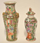 Cantonese vase decorated with panels of Chinese characters and birds and butterflies in a famille