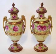 Pair of Continental vases and covers with a pink floral design (2)