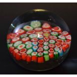 Large glass paperweight with a swirl design, the base with a Murano sticker