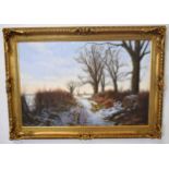 E J Bush, signed and dated 88, oil on canvas, Norfolk winter landscape with pheasants, 50 x 75cm