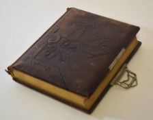 Late 19th century tooled leather covered photograph album with inscription to the front page dated