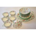 Group of Minton Haddon Hall tea wares comprising sugar box and cover, four cups and saucers and side
