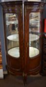 Two reproduction kingwood corner display cabinets applied with gilt metal mounts throughout, 174cm