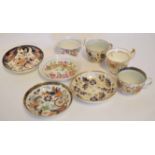 Collection of 19th century cups and saucers including two with Royal Crown Derby designs, a