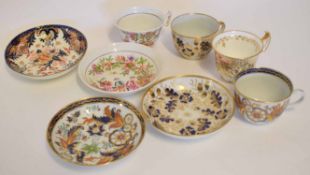 Collection of 19th century cups and saucers including two with Royal Crown Derby designs, a