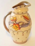 Charlotte Rhead ewer in Autumn leaf type design, 23cm high