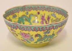 Chinese egg-shell porcelain bowl, the lobed body decorated in a famille jaune palette with dragons