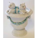 Rudolstadt Campana style urn with floral garland, two inset cats, turquoise ribbons and painted