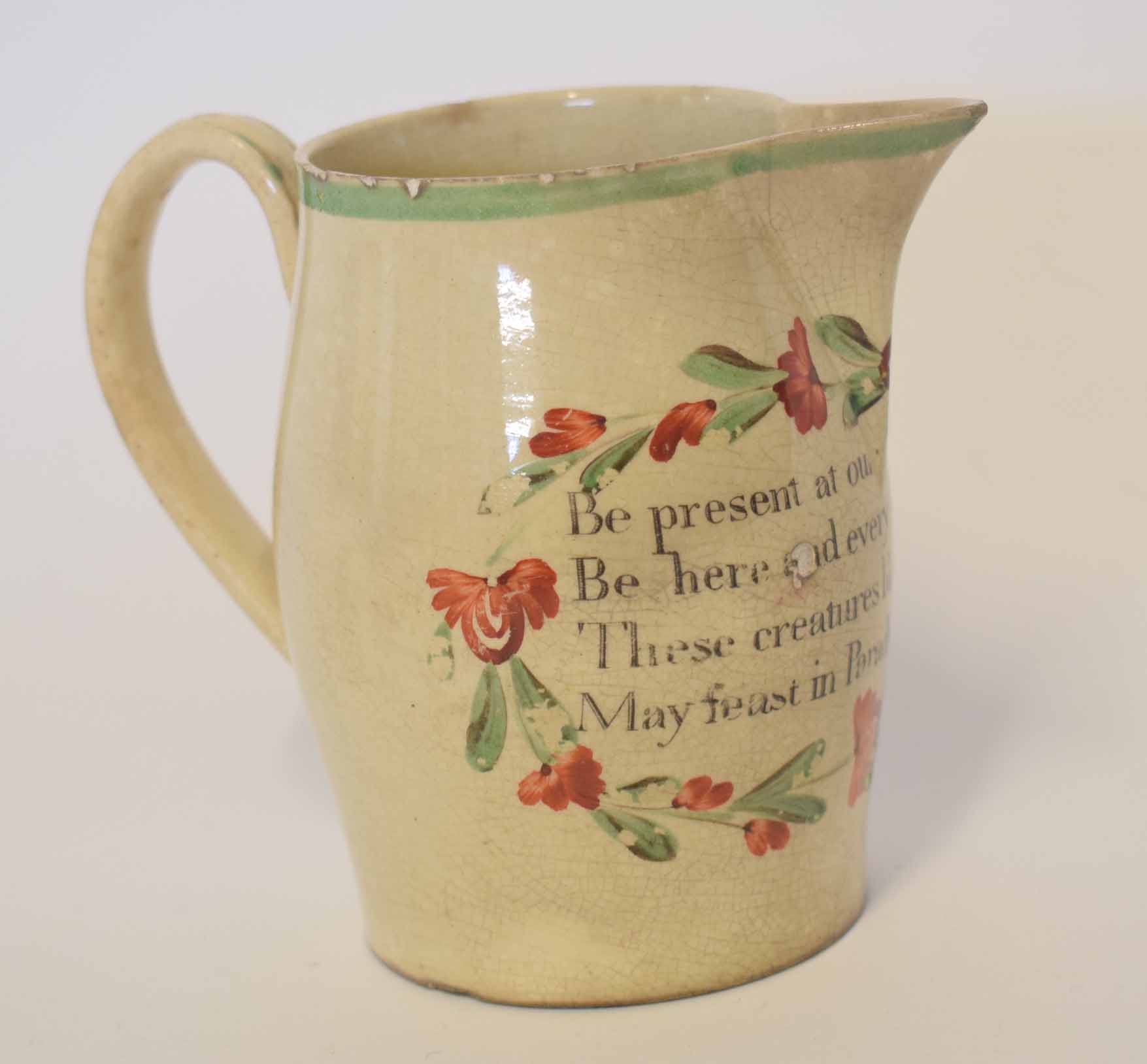 Staffordshire small jug with religious inscription, 10cm high