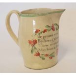 Staffordshire small jug with religious inscription, 10cm high