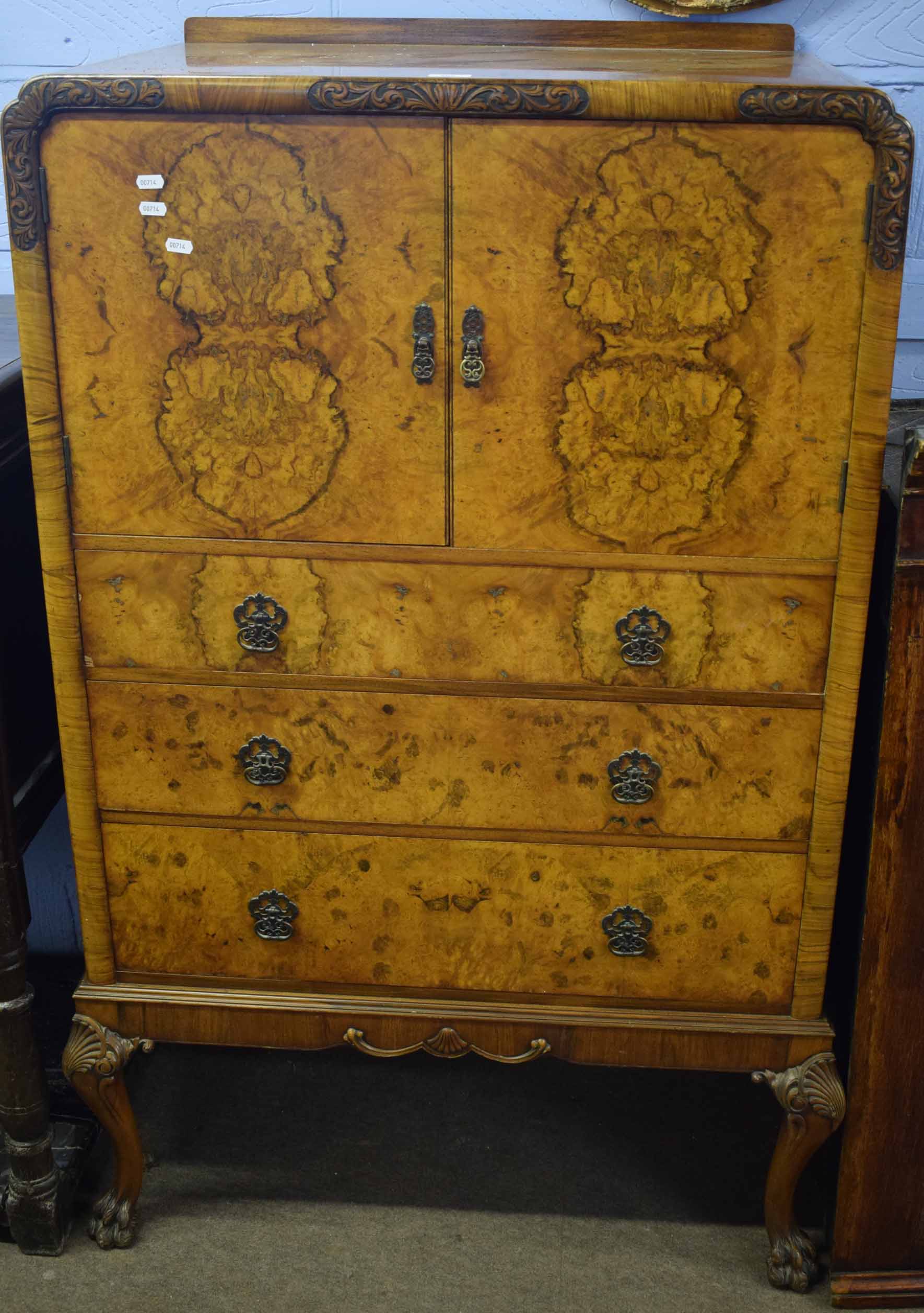 20th century walnut effect tallboy, two doors enclosing cupboard over three frieze drawers on