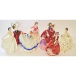 Group of eight Royal Doulton figurines including "Top of the Hill" and "Autumn Breezes", largest