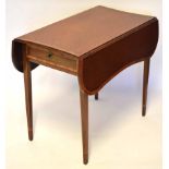 Edwardian Pembroke table, typically fitted at one end with a frieze drawer on tapering supports,