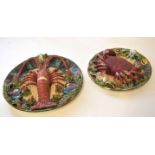 Two dishes with Pallasey type glazes, one with a crab, the other with a lobster, surrounded by