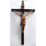 Wooden crucifix with resin figure of Christ on the cross, 56cms high