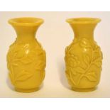 Pair of Peking glass vases with an applied floral design, 9cm high