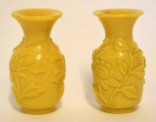 Pair of Peking glass vases with an applied floral design, 9cm high