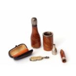 Mixed Lot: smoker's pipe modelled in the form of a champagne bottle, together with an amber coloured