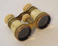 Pair of late 19th century French gilt brass and ivory opera glasses of typical form with screw