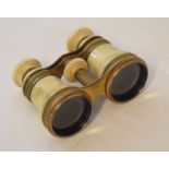 Pair of late 19th century French gilt brass and ivory opera glasses of typical form with screw