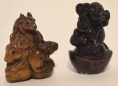 Two carved netsuke, one modelled as a monkey seated on a shell, the other as a group of three rats