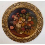 Arthur Divoli, signed oil on board, Still Life study of mixed flowers in a glass vase, 45cm diam