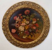 Arthur Divoli, signed oil on board, Still Life study of mixed flowers in a glass vase, 45cm diam