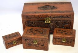 Graduated set of 20th century camphor wood chests, four in all, largest 73cm, smallest 25cm