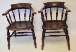 Two smoker's bow chairs, each with spindle backs and solid seats, 19th century