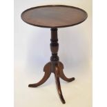Mahogany circular pedestal table with snap top and tripod base, 52cm wide