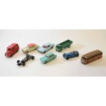 Mixed Lot: eight various model cars including Dinky flat-bed truck, luxury coach, Ford Anglia,