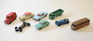 Mixed Lot: eight various model cars including Dinky flat-bed truck, luxury coach, Ford Anglia,