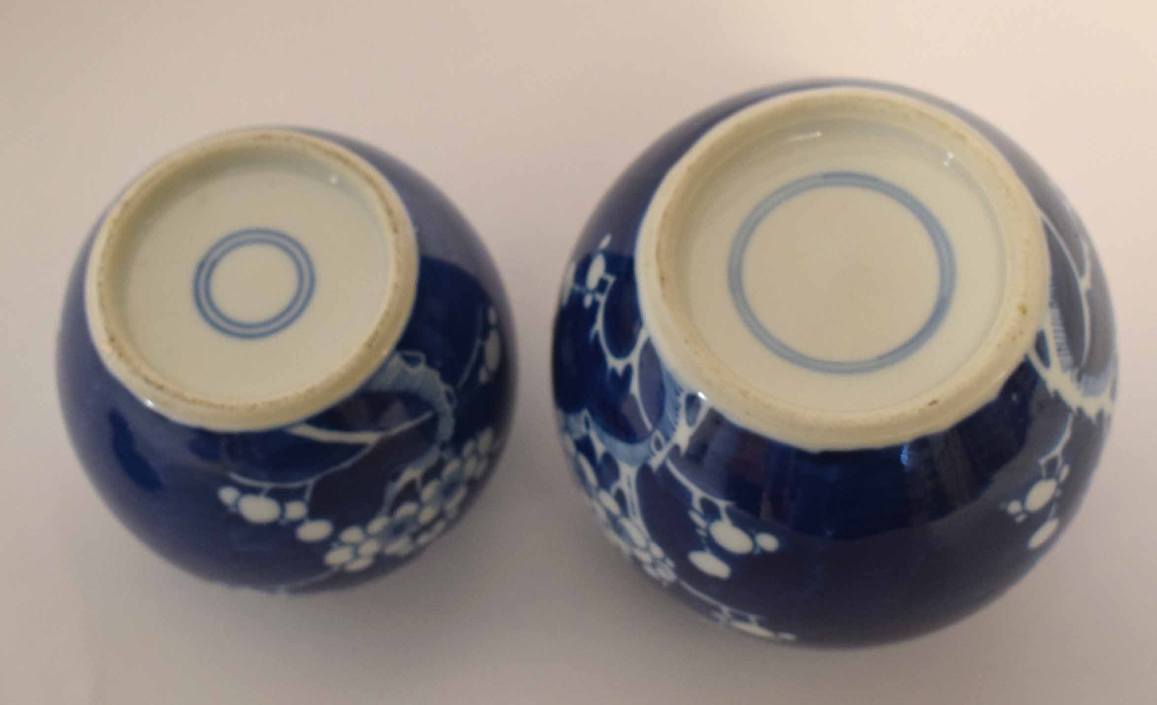 Pair of Chinese porcelain ginger jars and covers decorated with prunus on a blue ground, 12cm high - Image 2 of 2