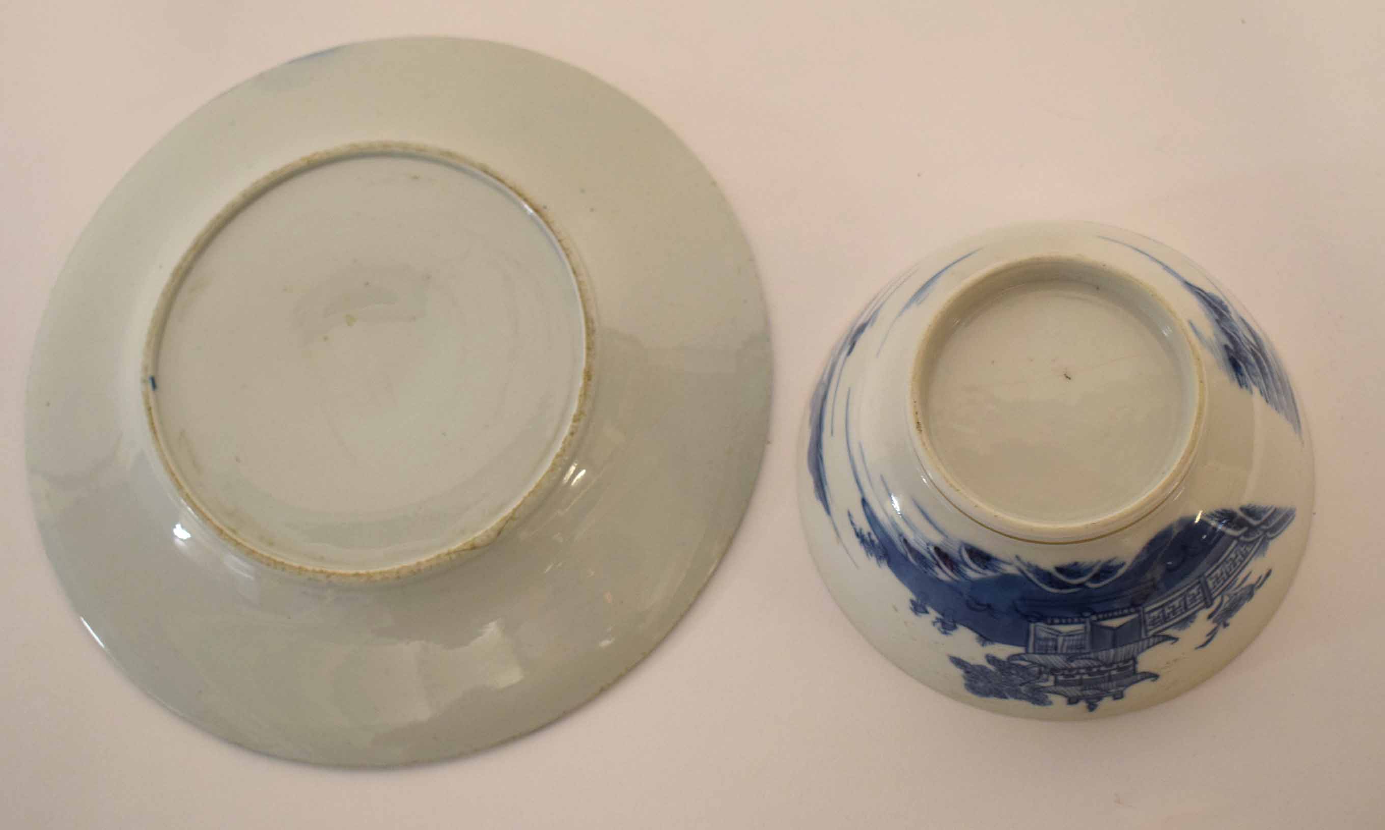 Chinese export blue and white bowl decorated with a pagoda and houses within a gilt rim, together - Image 2 of 2