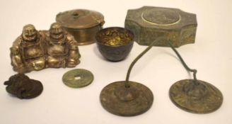 Group of Oriental metal wares comprising a pair of Buddhas, metal ware box and cover, various