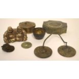 Group of Oriental metal wares comprising a pair of Buddhas, metal ware box and cover, various