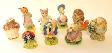 Group of Beswick ware figures, some from the Beatrix Potter series including Old Mr Brown and a foxy